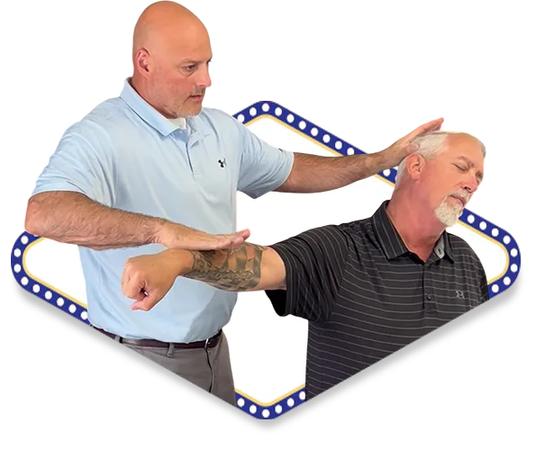 Dr. Dale Kimberlin performing neck muscle resistance evaluation for workplace injury treatment and posture correction at Ankeny Iowa chiropractic clinic.