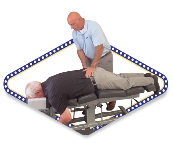 A chiropractor performing a spinal adjustment on a patient lying face down on a chiropractic table, framed by a diamond-shaped border with blue lights.