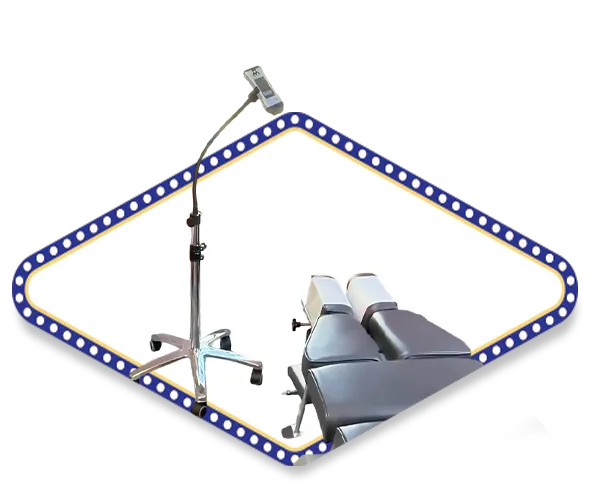 Cold laser therapy device positioned beside a chiropractic treatment table at Kimberlin Chiropractic Health Systems.