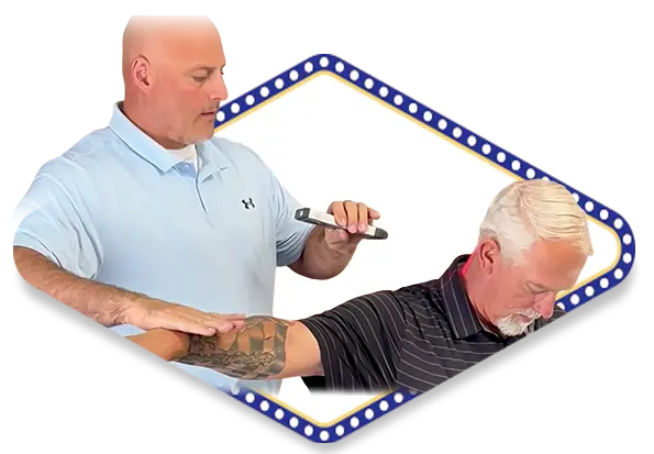 Dr. Dale Kimberlin providing non-invasive cold laser therapy treatment for male patients' neck pain at Kimberlin Chiropractic Health Systems in Ankeny.